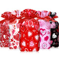Capoda 50 Pcs Valentines Day Treat Bags Plastic Drawstring Candy Bags Valentine Heart Shaped Gift Bag Pouch for Valentines Day Classroom Exchange Gifts Wedding Party Favor Supplies 6 x 9 Inch